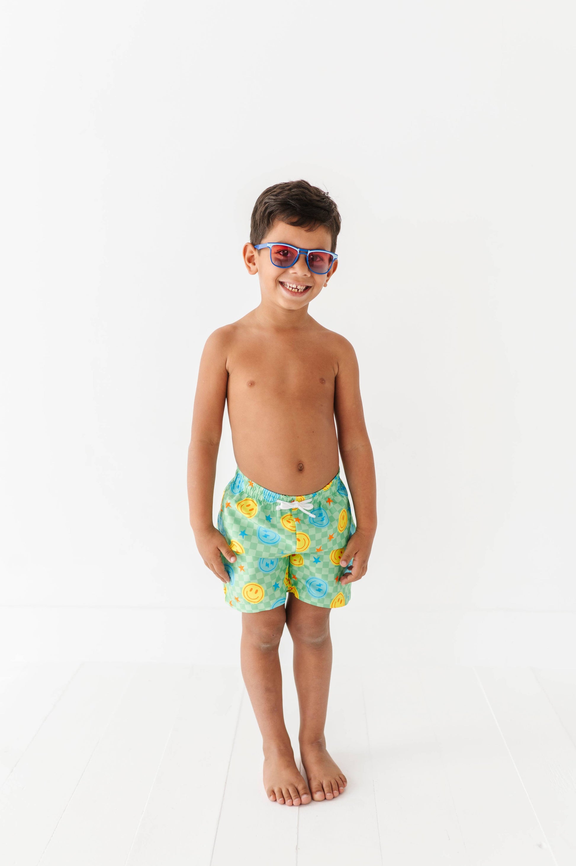 Electric Smiles Swim Trunks