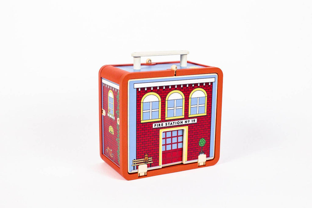 Outside box of our wooden fire house suitcase travel toy for kids 