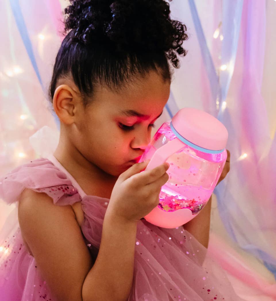 Pink sensory play jar with water-activated color-changing lights