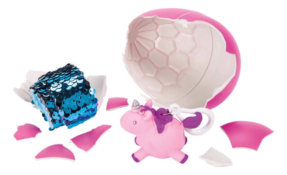 That’s Crackin mystery egg opened showing hidden fidget toys and squishy toy