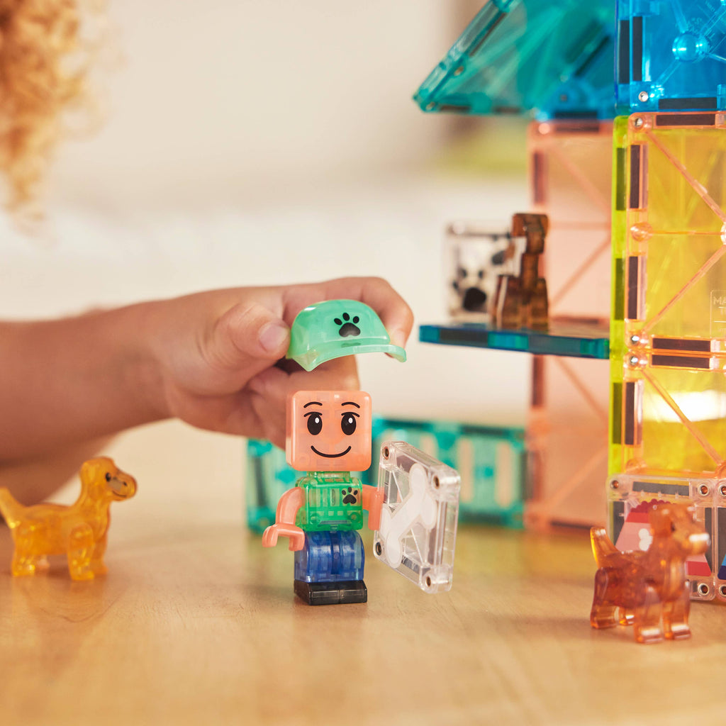 The Park Pup Ranger reporting for duty passing out bones from the MAGNA-TILES® Puppy Park – 27-Piece Magnetic Building Set