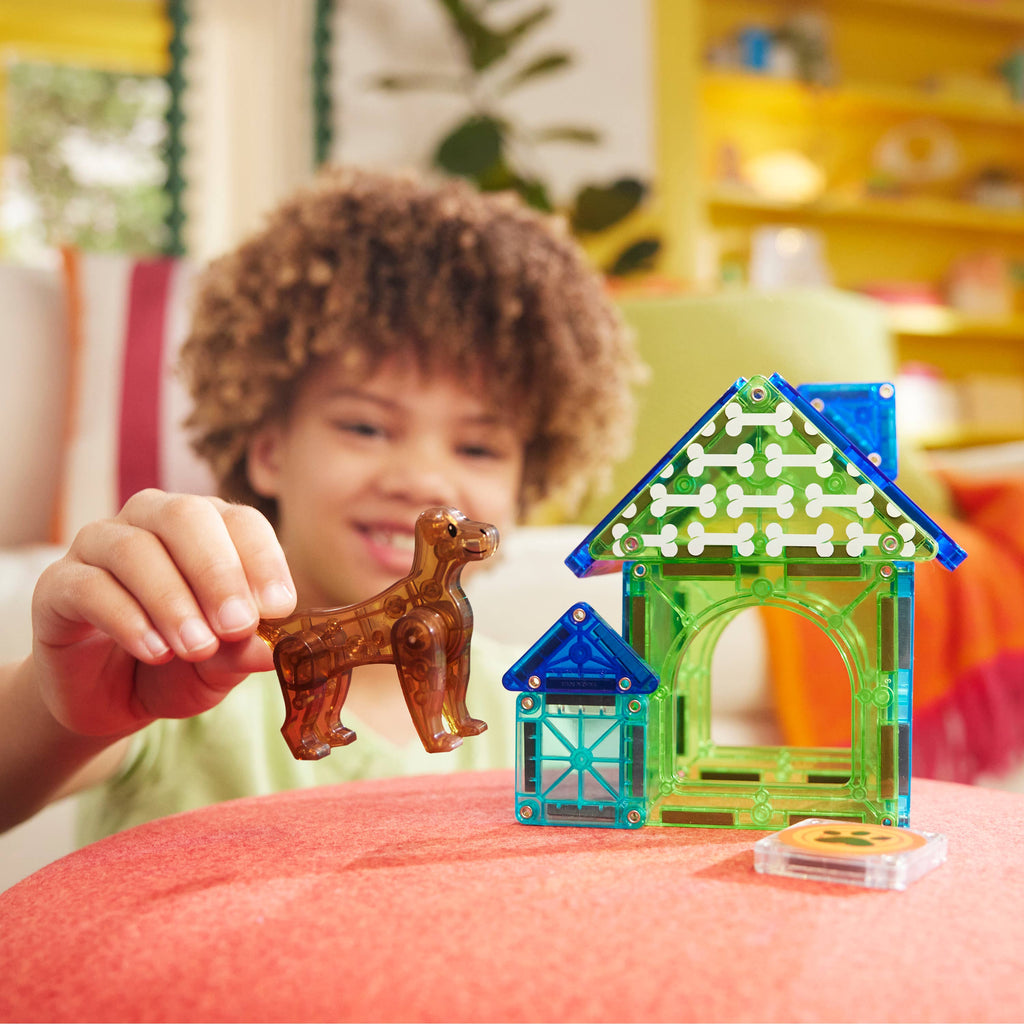 This kid is having some creative playtime with our MAGNA-TILES® Dog House – 13-Piece Magnetic Building Set!