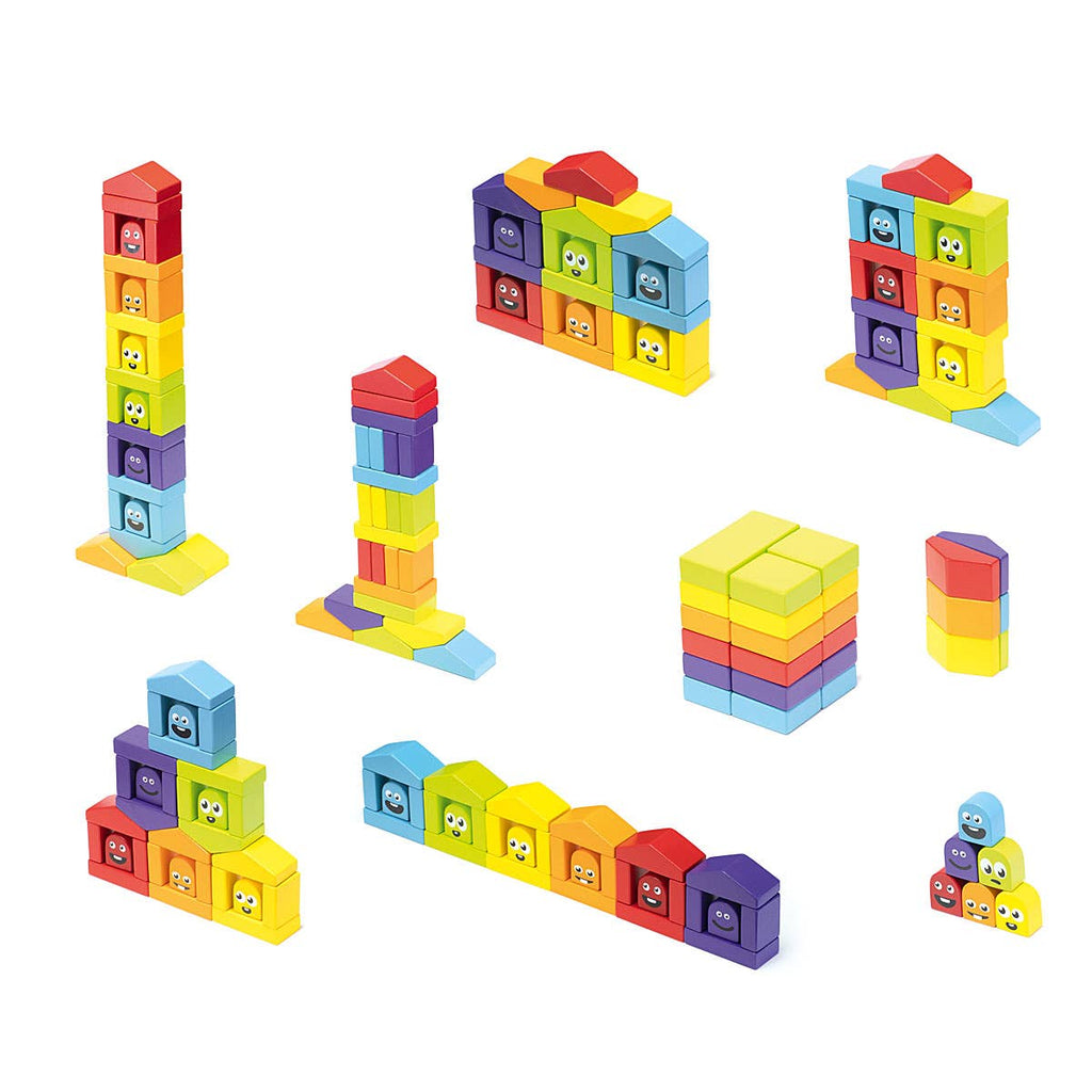 Wooden building blocks arranged into colorful house structures