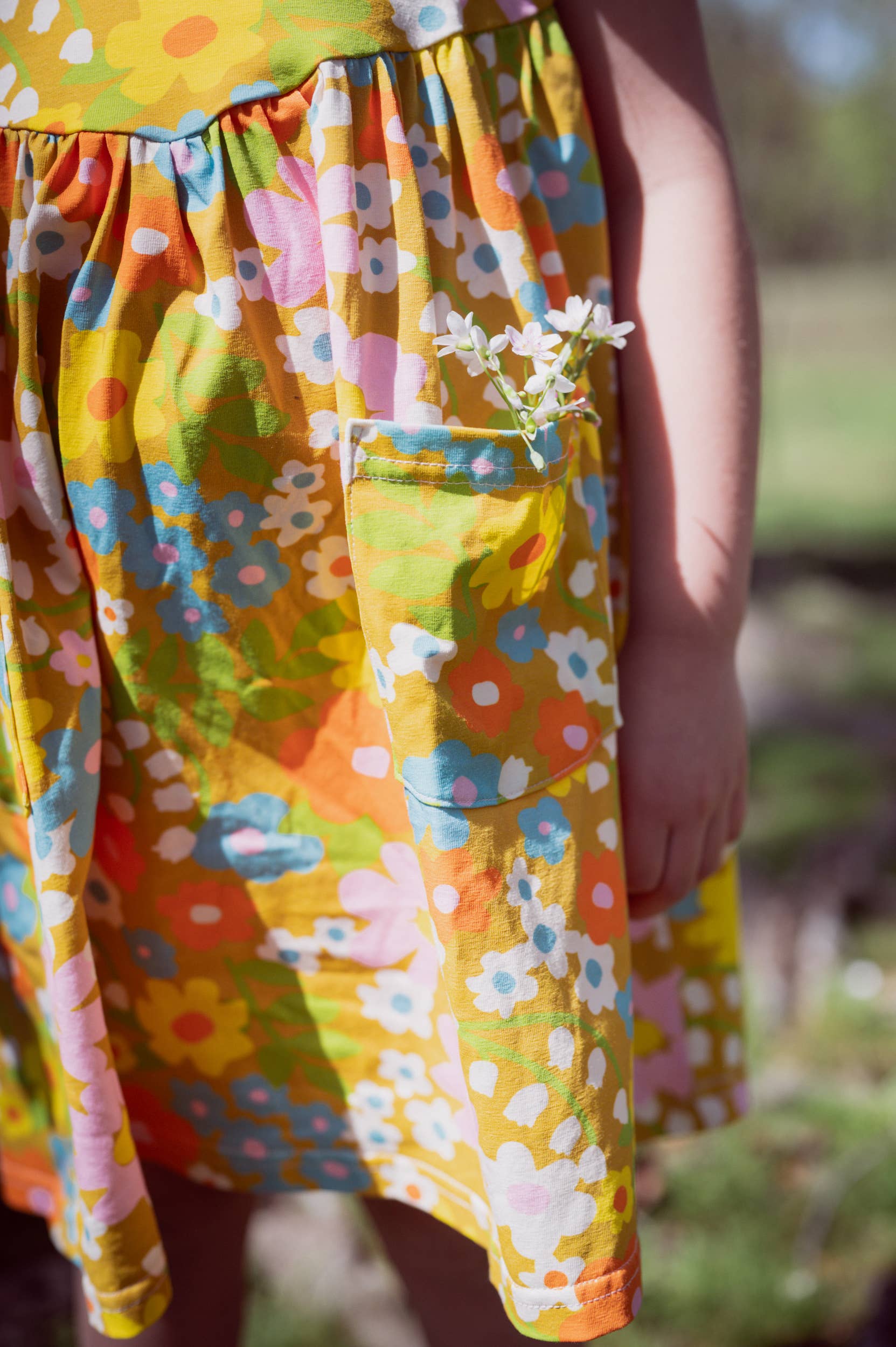 Girl’s Flutter Dress in Sixties Wild Blooms