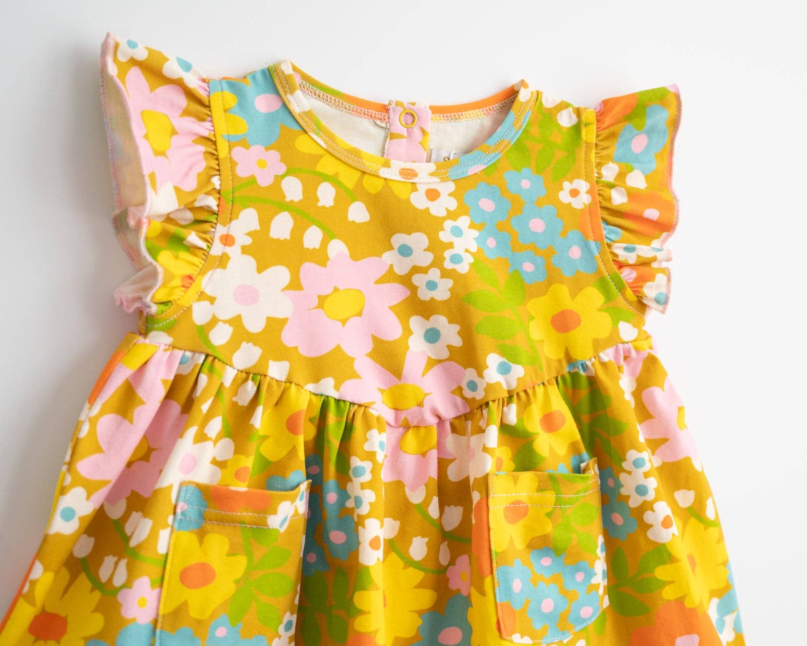 Girl’s Flutter Dress in Sixties Wild Blooms