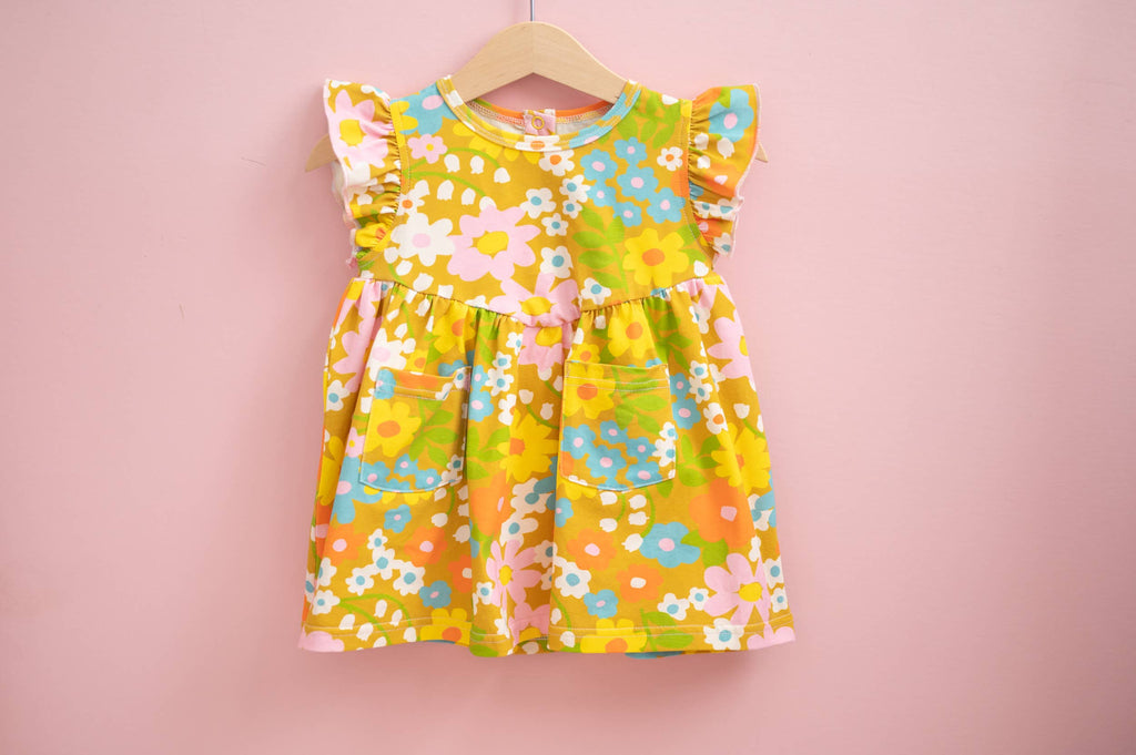 Girl’s Flutter Dress in Sixties Wild Blooms