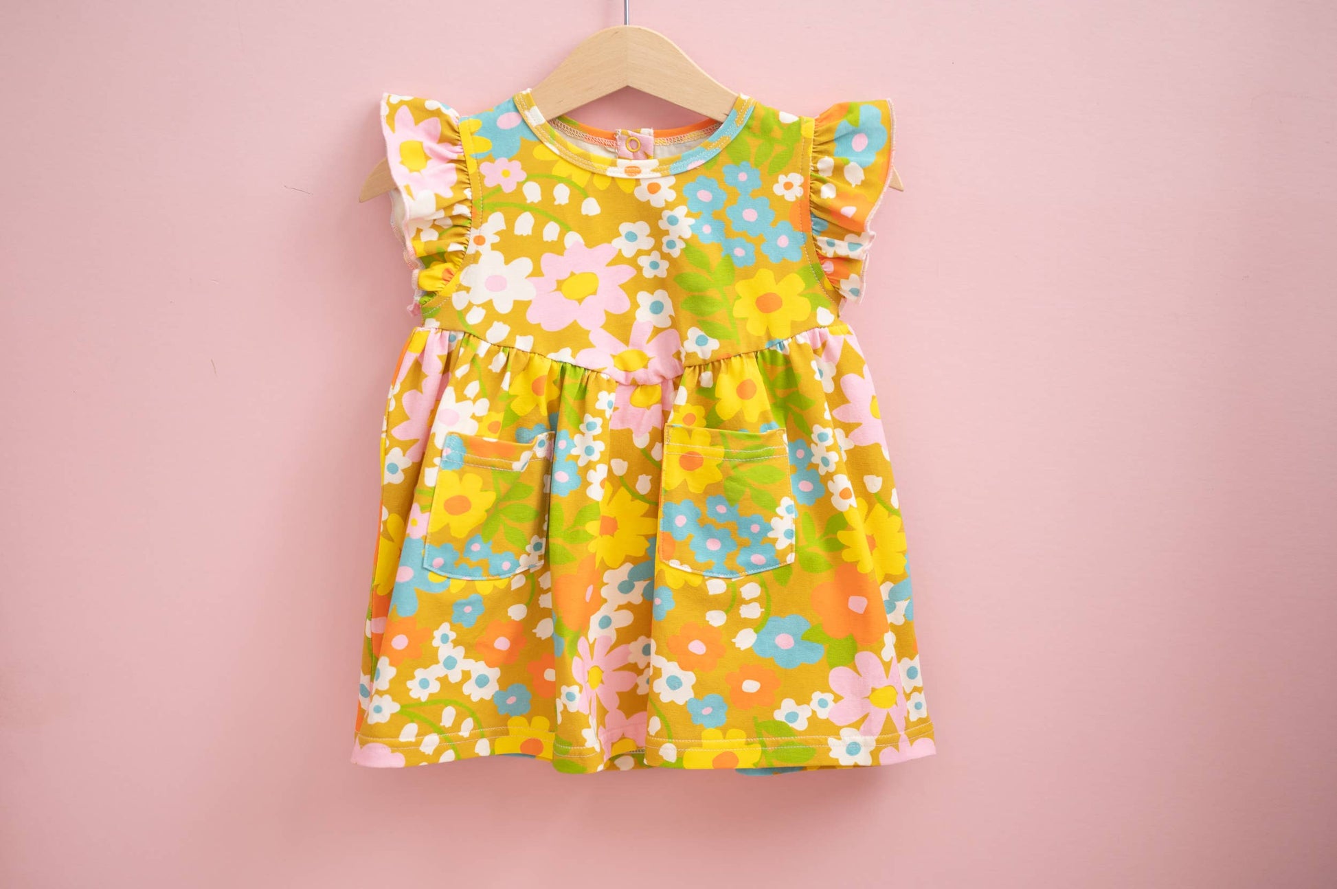 Girl’s Flutter Dress in Sixties Wild Blooms