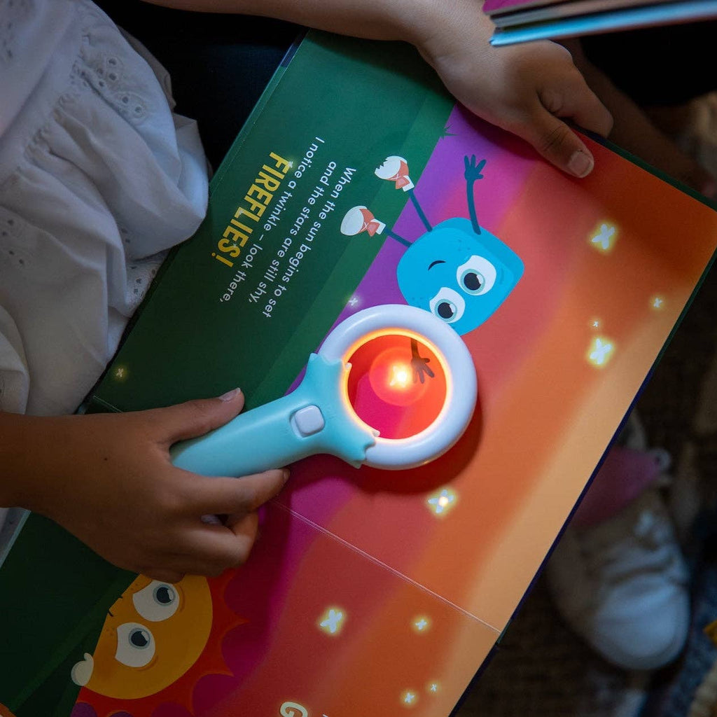 interactive glowing children’s book with magic magnifier wand